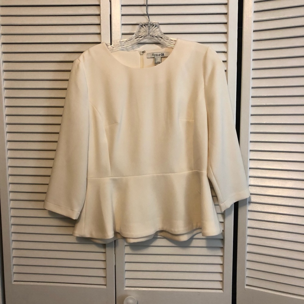 Never worn! Classy ivory peplum top- size Large.